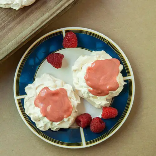 Pavlova with lemongrass infused cream and strawberry curd.