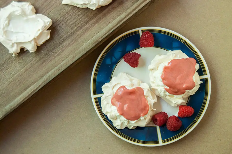 mini pavlova with strawberry curd and lemon grass whipped cream