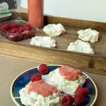 Pavlova with lemongrass infused cream and strawberry curd.