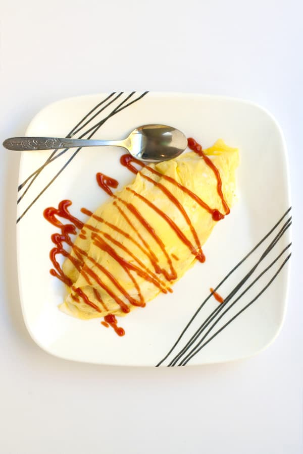 Cheater's Japanese Omelette Rice- Known in Japan as Omurice. You don't need chef skills to make a beautiful Japanese omelette rice with this trick. An easy meal that is loved by kids to adults. 
