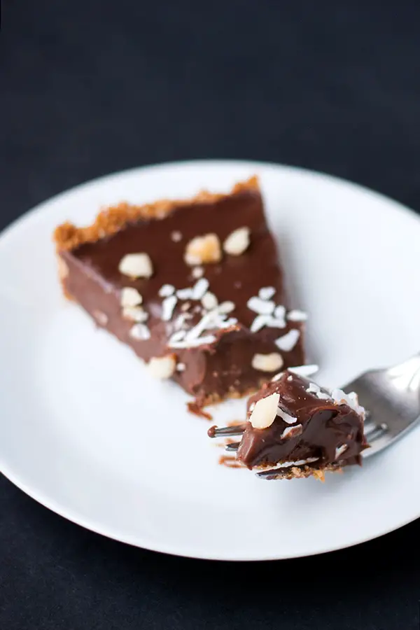 Coconut & Milk chocolate tart with macadamia nuts and coconut