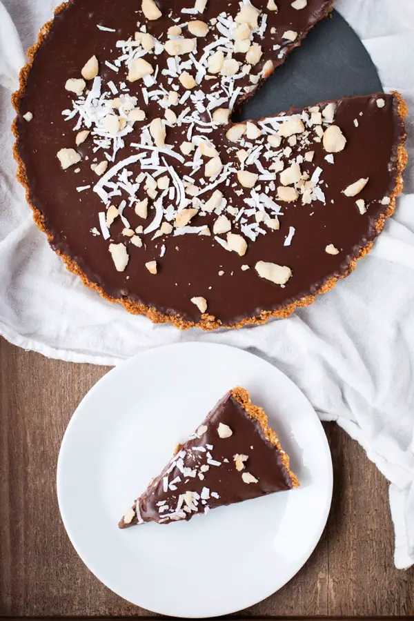 Chocolate ganache tart with macadamia and coconut