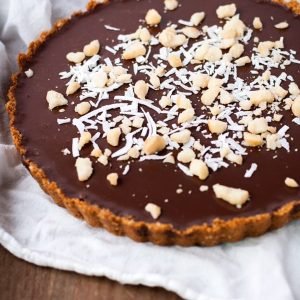 Chocolate ganache tart with macadamia and coconut