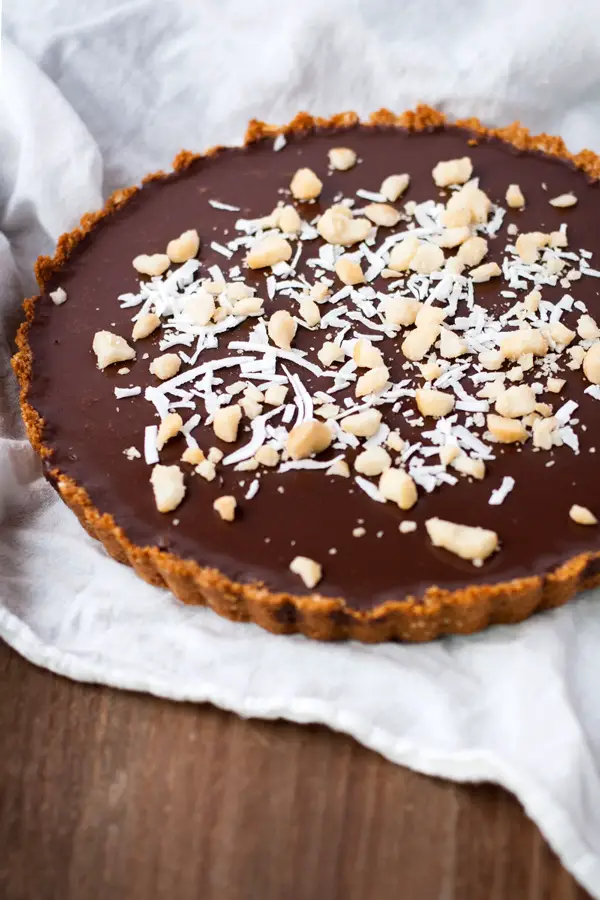 Chocolate ganache tart with macadamia and coconut