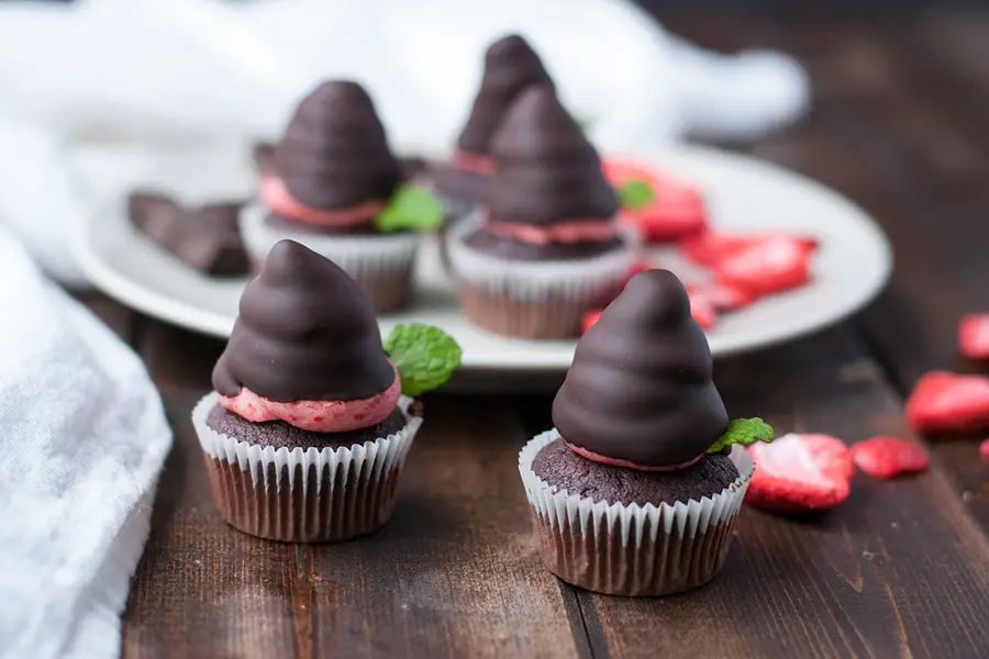 Chocolate dipped strawberry buttercream- a play on the classic romantic treat, this buttercream uses freeze dried strawberries to get its beautiful pink hue and intense strawberry flavor.