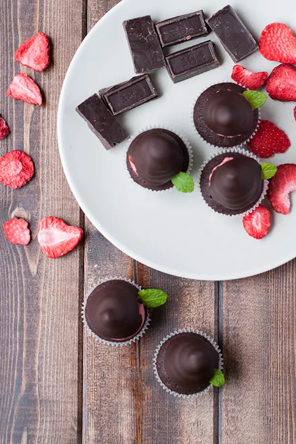 Chocolate dipped strawberry buttercream- a play on the classic romantic treat, this buttercream uses freeze dried strawberries to get its beautiful pink hue and intense strawberry flavor.