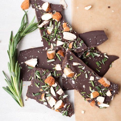 Rosemary Bark- This ultra thin dark chocolate rosemary bark is loaded with sea salt, roasted almond pieces, and chopped fresh rosemary.