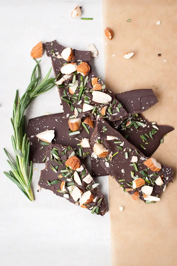 Rosemary Bark- This ultra thin dark chocolate rosemary bark is loaded with sea salt, roasted almond pieces, and chopped fresh rosemary. 