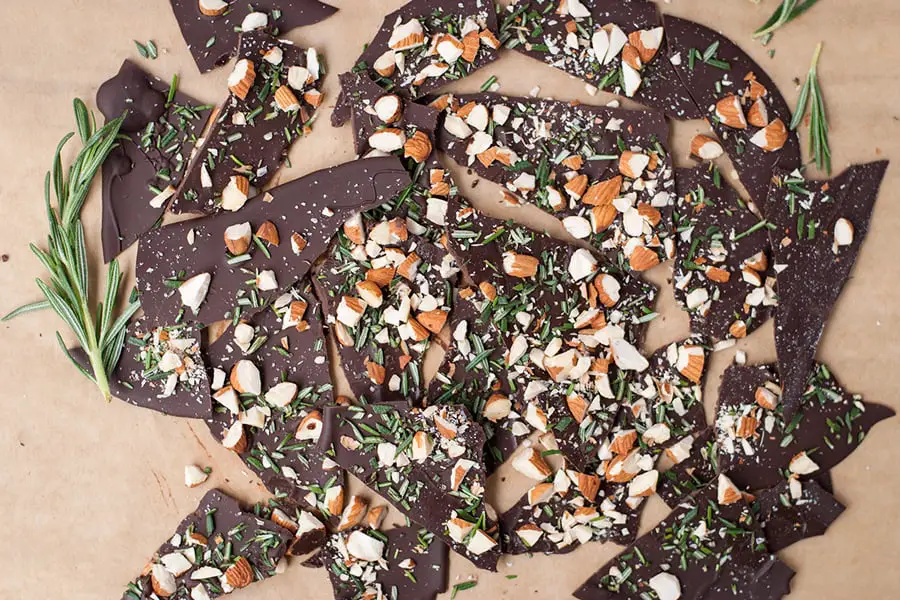 Rosemary Bark- This Ultra Thin Dark Chocolate Rosemary Bark Is Loaded With Sea Salt, Roasted Almond Pieces, And Chopped Fresh Rosemary.