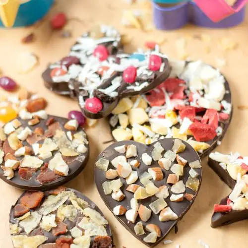 Cookie Cutter Chocolates- These cookie cutter chocolates are a great activity to do with kids! Melted chocolate is poured into cookie cutter molds and topped with all sorts of fun toppings!