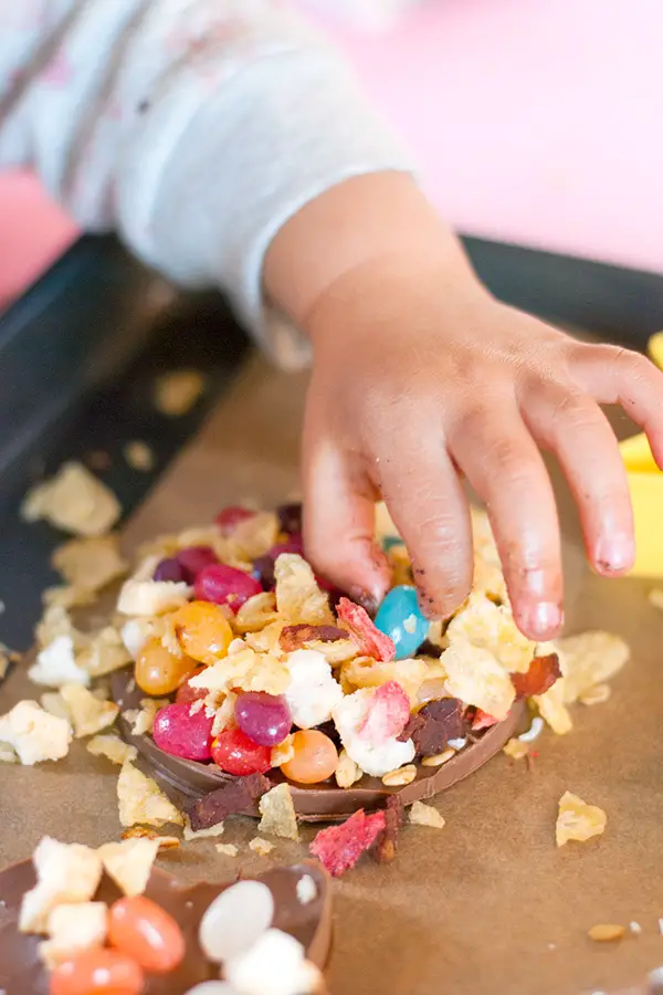 Cookie Cutter Chocolates- These cookie cutter chocolates are a great activity to do with kids! Melted chocolate is poured into cookie cutter molds and topped with all sorts of fun toppings!