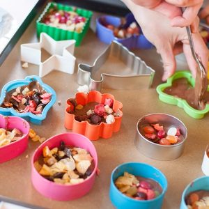 Cookie Cutter Chocolates- These cookie cutter chocolates are a great activity to do with kids! Melted chocolate is poured into cookie cutter molds and topped with all sorts of fun toppings!