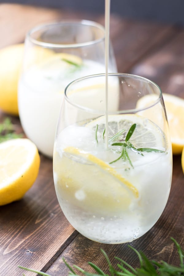 Rosemary Lemon Cream Soda- This lemonade has been kicked up a notch with the addition of rosemary simple syrup, sparkling water, and a dash of cream. The result is an herby, fizzy, tangy, yet creamy drink that is perfect for the upcoming summer weather. 