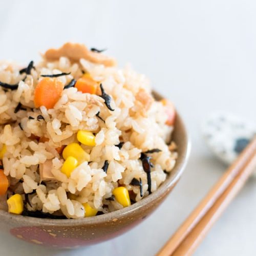 Tuna takikomi rice, or takikomi gohan, is a Japanese seasoned rice dish with veggies and tuna. Easy, filling, and nutritious, all you need to do is prep the ingredients, throw them in the rice cooker, and press start!