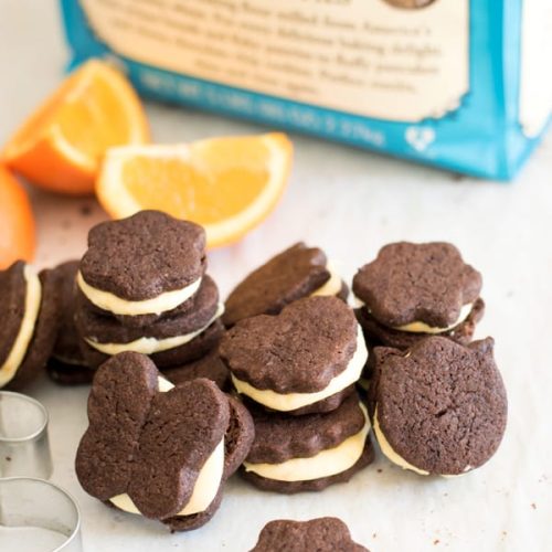 These adorable chocolate orange sandwich cookies have an intense chocolate flavor that pairs perfectly with the fresh orange buttercream.