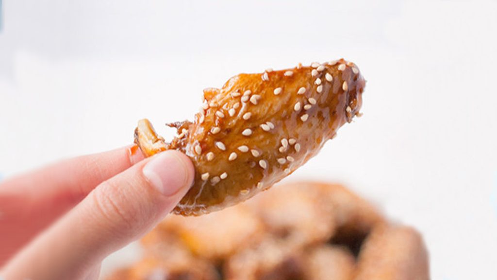 Baked Japanese chicken wings with soy sauce marinade and sesame seeds.