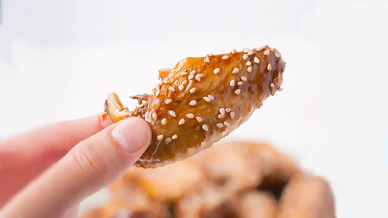 Baked Japanese chicken wings with soy sauce marinade and sesame seeds.